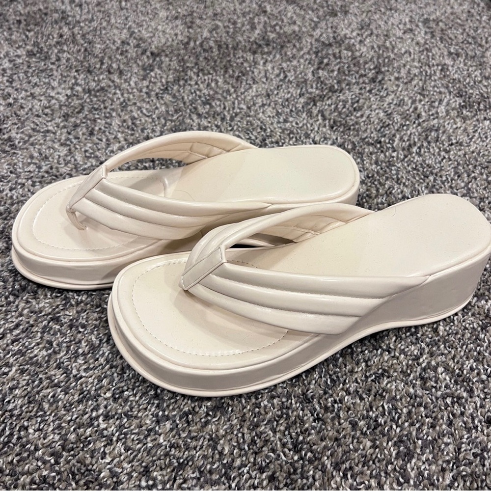 White slippers, really very comfortable.